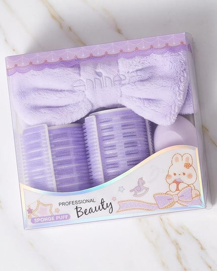 Rollers, a plush headband, and a soft powder puff-Accessories