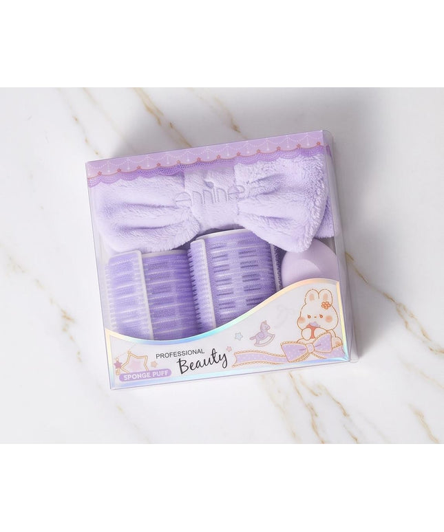 Rollers, a plush headband, and a soft powder puff-Accessories
