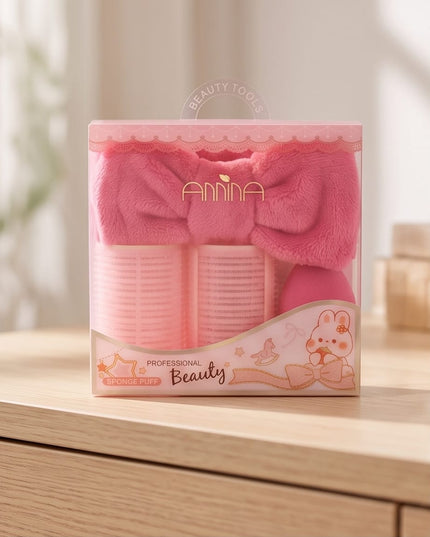 Rollers, a plush headband, and a soft powder puff-Accessories