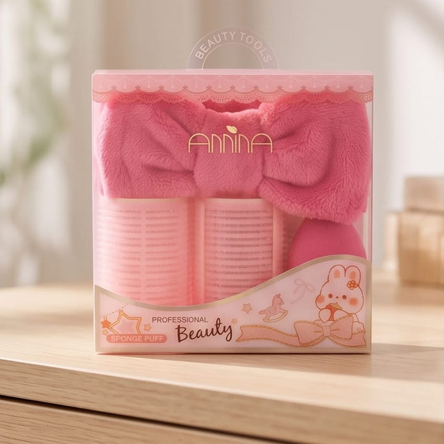 Rollers, a plush headband, and a soft powder puff-Accessories