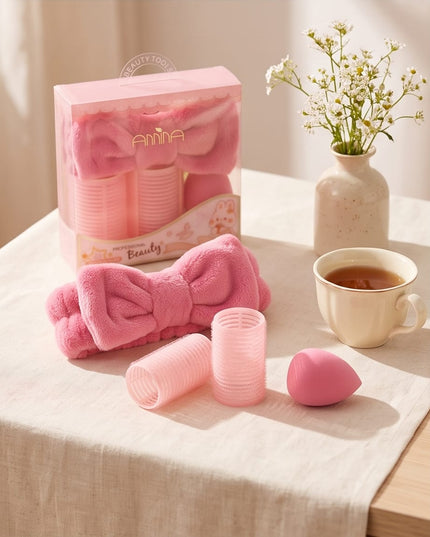Rollers, a plush headband, and a soft powder puff-Accessories