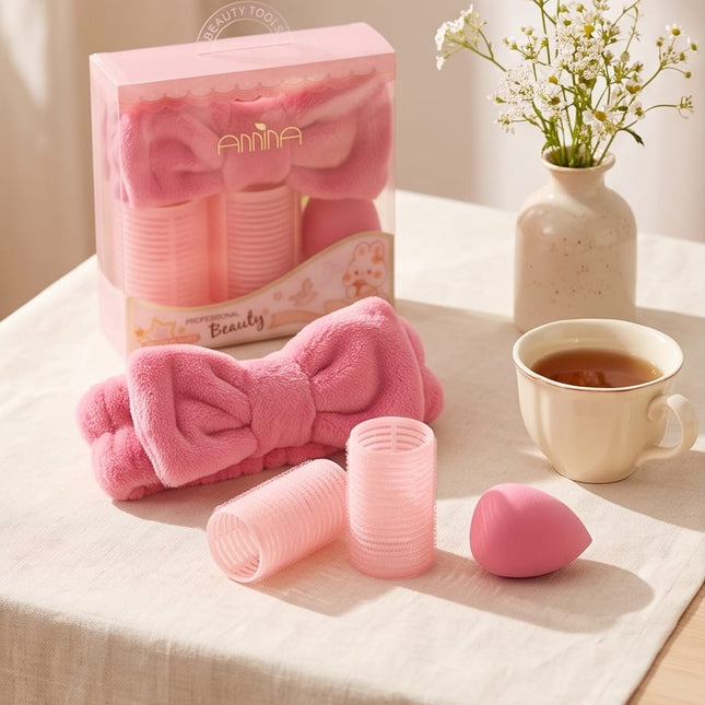 Rollers, a plush headband, and a soft powder puff-Accessories
