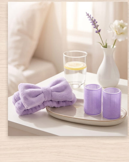 Rollers, a plush headband, and a soft powder puff-Accessories