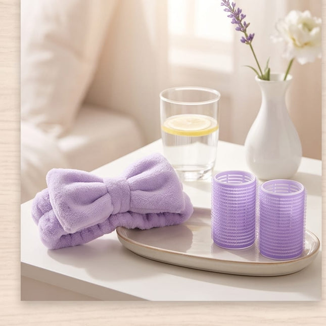 Rollers, a plush headband, and a soft powder puff-Accessories