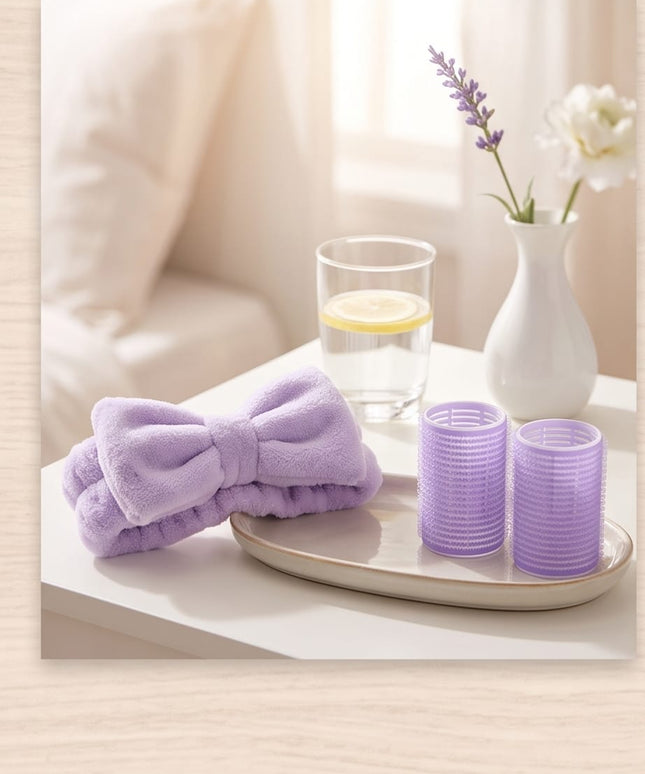 Rollers, a plush headband, and a soft powder puff-Accessories