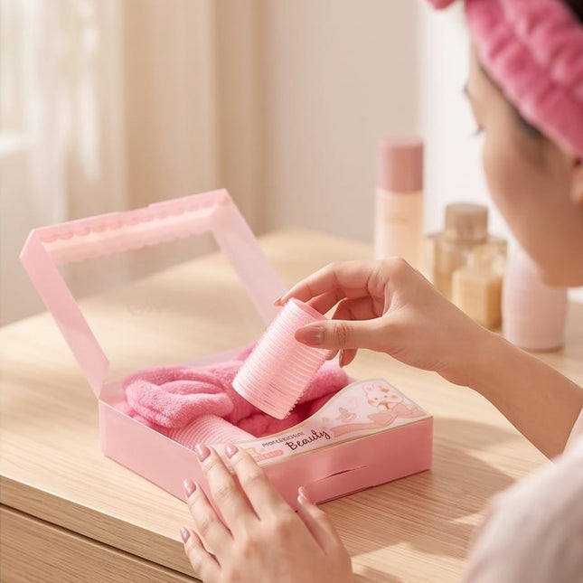 Rollers, a plush headband, and a soft powder puff-Accessories