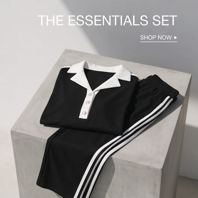 Brand Zee black ribbed lounge set with white polo collar, button detail, and sporty side-stripe trousers.