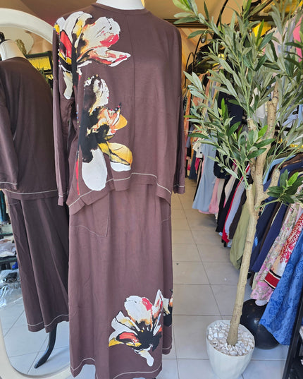 Brand Zee brown cotton long sleeve top and maxi skirt set with large white and yellow floral print on a mannequin