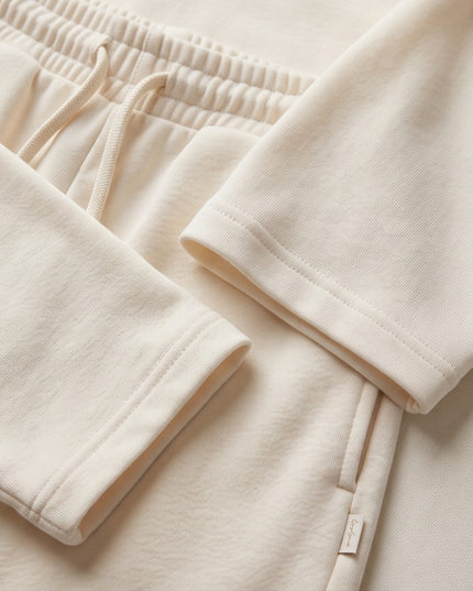 Brand Zee cream lounge set featuring soft fabric, elasticated drawstring shorts, and a crew neck top with side pocket