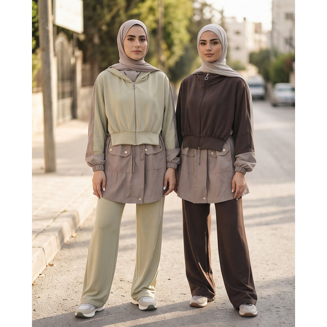 Two models wearing Brand Zee modest two-piece hooded jacket and wide-leg trouser sets in sage green and dark brown.