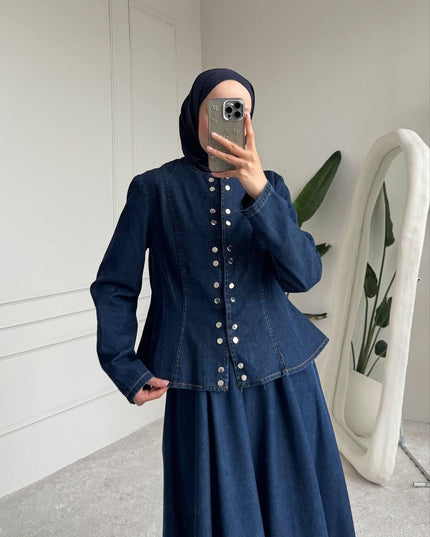 Brand Zee deep indigo denim two-piece set with a peplum jacket featuring metallic buttons and a matching maxi skirt.