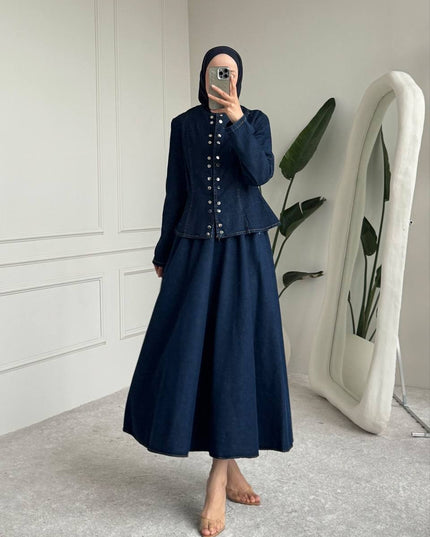 Brand Zee indigo denim two-piece set with a peplum jacket featuring metallic buttons and a matching maxi skirt.