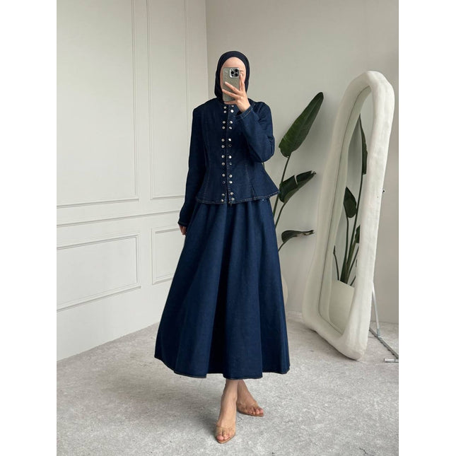 Brand Zee indigo denim two-piece set with a peplum jacket featuring metallic buttons and a matching maxi skirt.