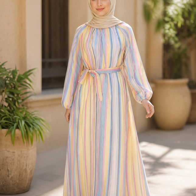 Brand Zee pastel striped long sleeve maxi dress with a matching tie-waist belt worn by a woman in a beige hijab.