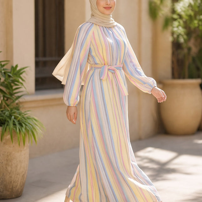 Brand Zee pastel striped long sleeve maxi dress with a tie waist, worn by a woman in a matching beige hijab.