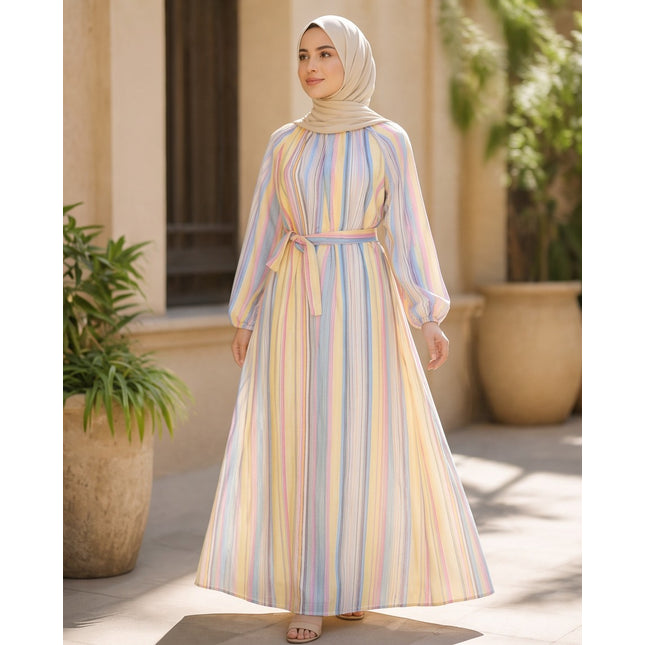 Brand Zee pastel striped long sleeve maxi dress with a tie-waist belt worn by a woman in a beige hijab