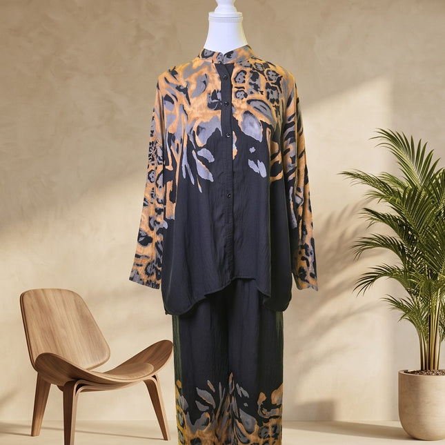 Brand Zee co-ord set featuring a long-line button-down shirt and wide-leg trousers in an ochre and charcoal animal print
