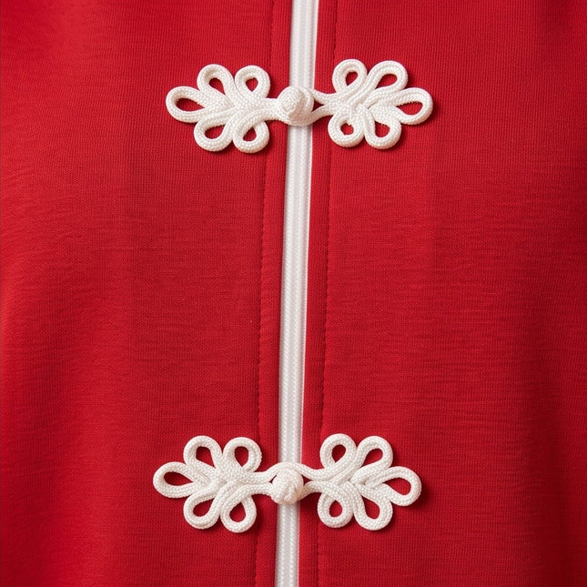 Brand Zee red zip-up tracksuit top featuring decorative white knot fastenings and a central white zip detail